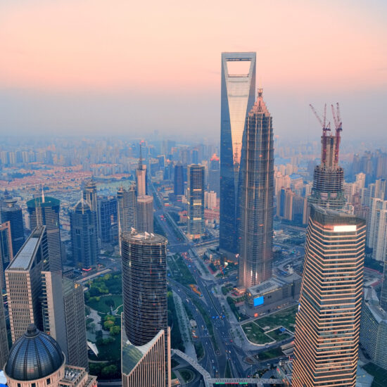 Shanghai aerial view with urban architecture and sunset